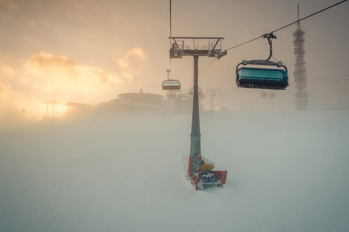 Ski lift chair through the fog