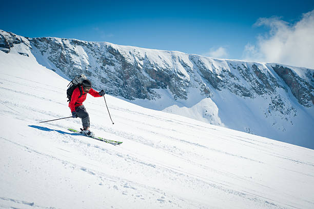 Skier Going Downhill stock photo