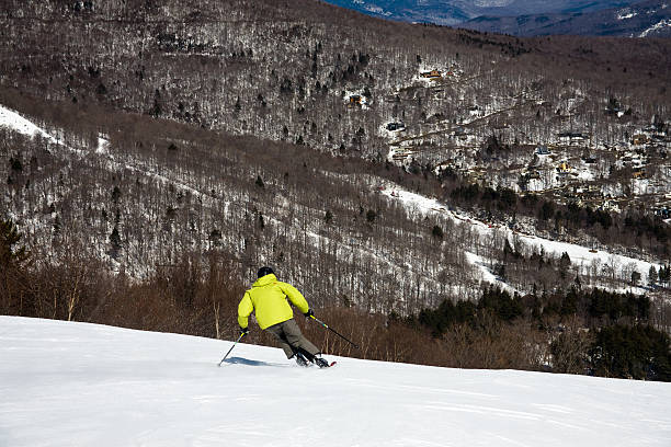 Skiing down stock photo