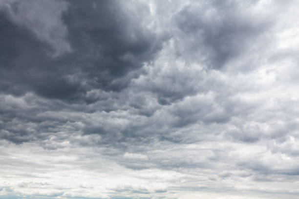 Sky covered by grey clouds stock photo