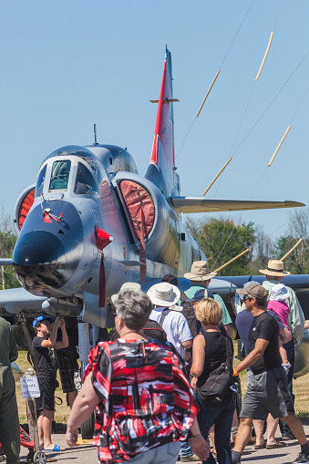 Gatineau, Canada - June 30, 2016: The Wings over Gatineau Airshow is an airshow at the Gatineau Executive Airport. This image shows the A-4 Skyhawk on the tarmac with people around.