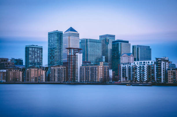 Skyline of Canary Wharf Skyline of Canary Wharf in London. A photo of a long exposure. canary wharf stock pictures, royalty-free photos & images