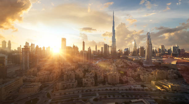 Skyline of Dubai Downtown at sunset with a dramatic sky stock photo