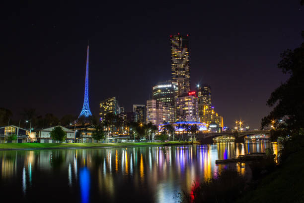 Skyline of Melbourne and the Yarra River, Melbourne, Australia. Modern skyscraper in Melbourne at night, Australia arts centre melbourne stock pictures, royalty-free photos & images