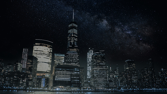 New York City by night with milky way