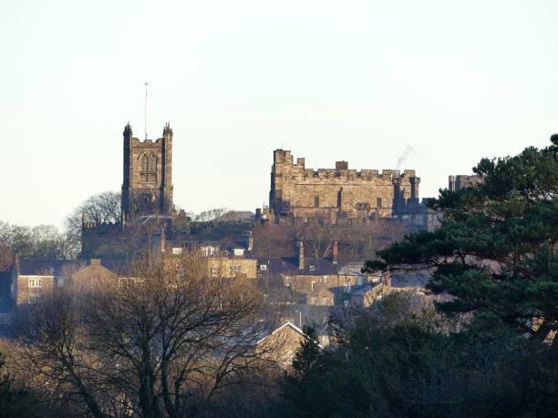 Skyline view across the City of Lancaster towards Lancaster Castle and the Priory Church Lancaster, Lancashire, UK - December 24th 2018: Skyline view across the City of Lancaster towards Lancaster Castle and the Priory Church lancaster lancashire stock pictures, royalty-free photos & images