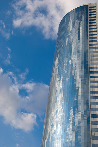 Skyscraper Reflecting Clouds in NYC, USA stock photo