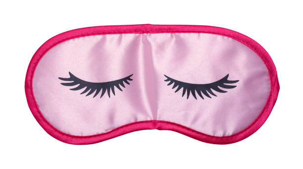 Sleep Mask Pink Sleep Mask with Eye Lashes Front View Cut Out. eye mask stock pictures, royalty-free photos & images