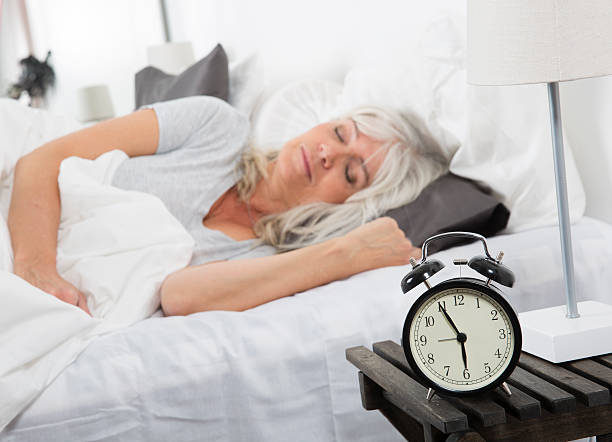 sleeping woman - nap middle age woman bildbanksfoton och bilder