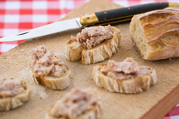 Slice bread with meat pate on wood board toast delicatessen terrine baguette pate photos stock pictures, royalty-free photos & images