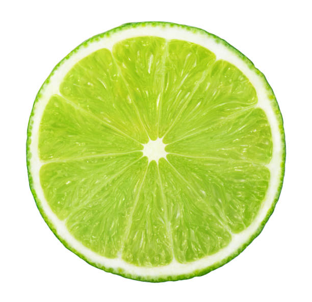 slice of lime without shadow isolated on white background - lime imagens e fotografias de stock