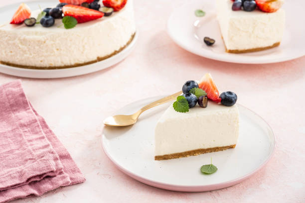 Slice of New York Cheesecake with berries. stock photo