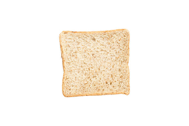 slice of  whole wheat bread isolated on white background stock photo