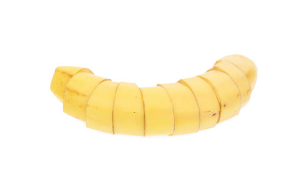 Sliced banana isolated on white background. stock photo