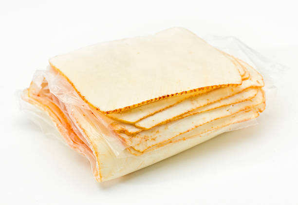 Sliced Muenster Cheese  muenster cheese stock pictures, royalty-free photos & images