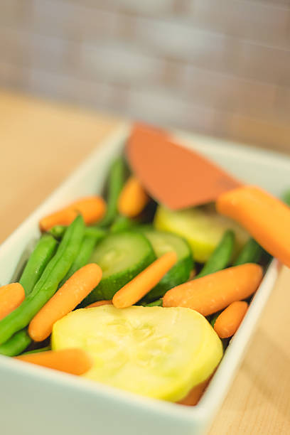 Sliced veggies in dish stock photo