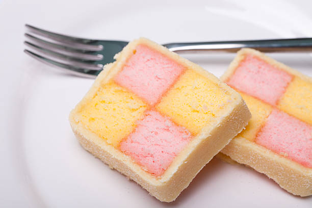 Slices of Battenburg Cake on a plate stock photo