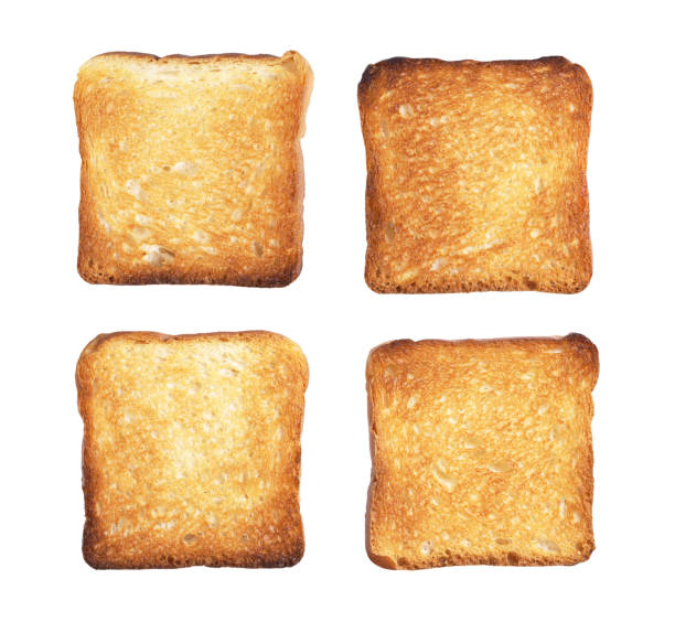 Slices of toast bread Slices of small toast bread isolated on white background, top view toasted food stock pictures, royalty-free photos & images
