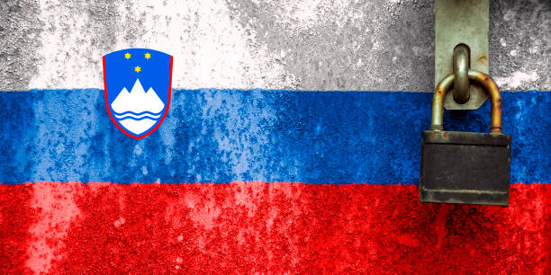 Slovenia flag is on texture. Template. Coronavirus pandemic. Countries may be closed. Locks. stock photo