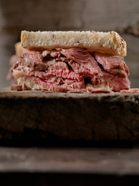 Slow Roasted, Roast Beef Sandwich Medium Rare Slow Roasted, Roast Beef Sandwich roast beef sandwich stock pictures, royalty-free photos & images