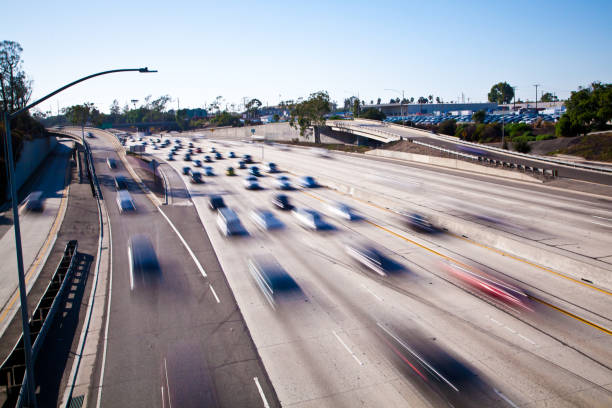 Slow shutter speed of cars moving on the 405 Freeway in Long Beach, California stock photo