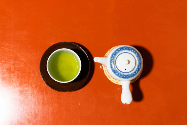Slowly and mindfully brew a cup of delicious Japanese tea. stock photo