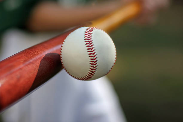 Slugger a baseball player hitting a ball hitting stock pictures, royalty-free photos & images