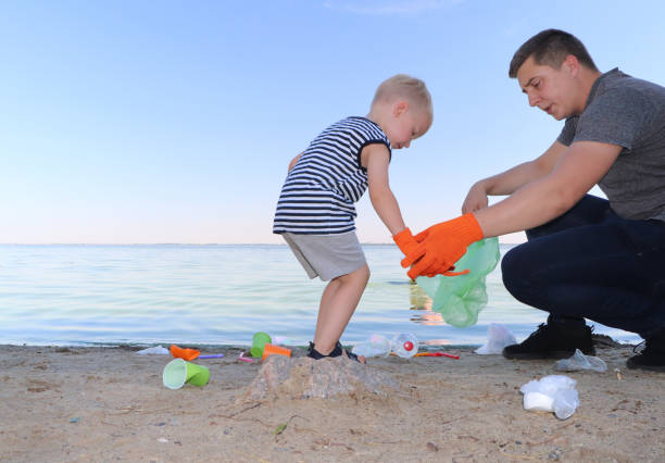 406 Picking Up Litter On Beach Stock Photos, Pictures & Royalty-Free Images  - iStock