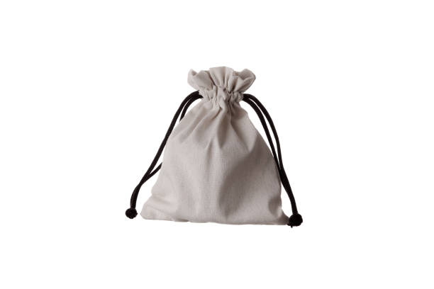 Small fabric pouch with a drawstring for tying. Isolate on a white background. stock photo