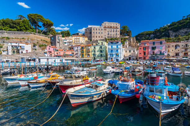 Small fishing boats at harbor Marina Grande in Sorrento, Campania, Amalfi Coast, Italy. stock photo