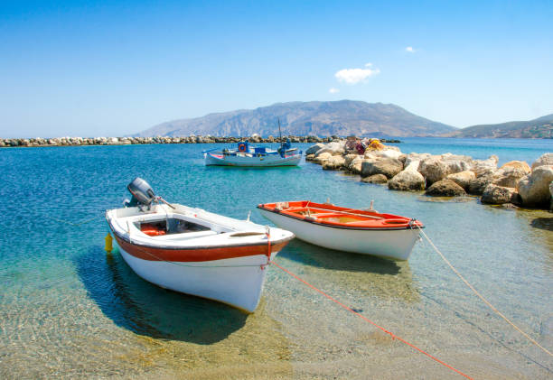 small fishing boats at the harbour of Skyros island stock photo