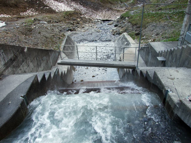 Small hydro power plant on the stream Gufelbach in Weisstannen - Canton of St. Gallen, Switzerland stock photo