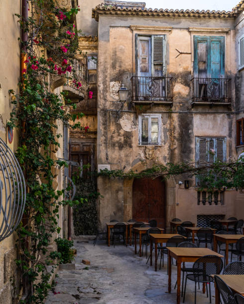 A small square among old buildings in Tropea historic centre, Calabria, Italy stock photo