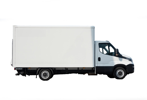Small white delivery or moving truck isolated on white background. image contains a clipping path.
