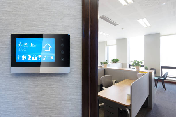 smart screen in modern office smart screen on wall in modern office smart thermostat stock pictures, royalty-free photos & images
