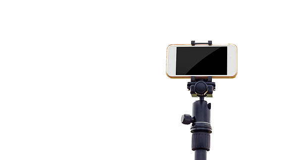 smartphone on tripod isolate white background - smartphone filming imagens e fotografias de stock
