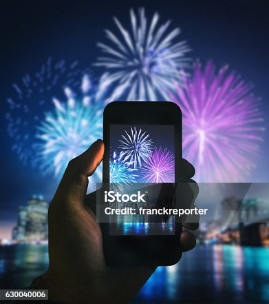 istock smartphone take a pic of the nyc celebration 630040006