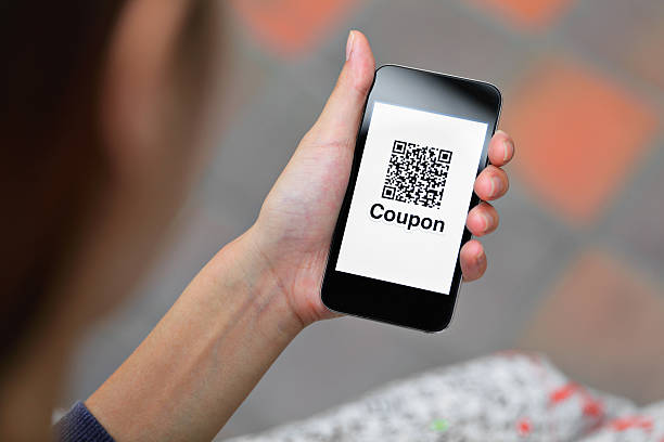 smartphone with electronic coupon stock photo