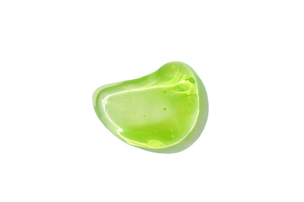 Smear, drop of green gel, aloe Vera transparent texture gel stock photo