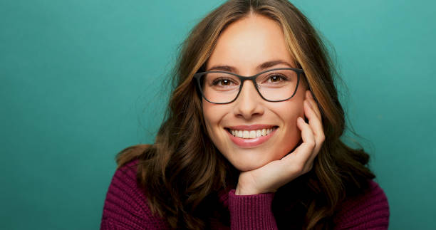 Smiling babe in glasses stock photo