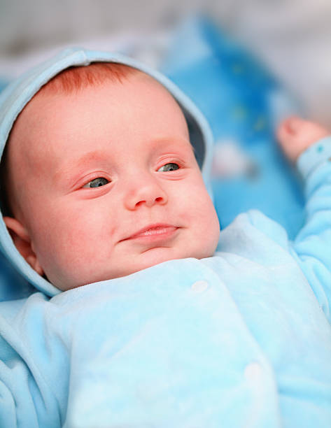 Smiling baby boy stock photo