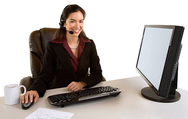 Smiling Businesswoman With Headset stock photo