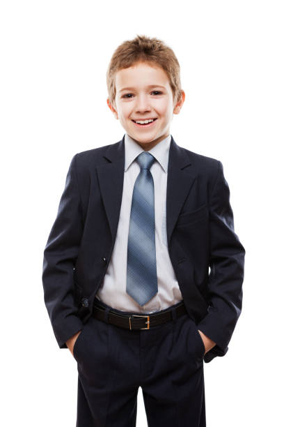 Smiling child boy in business suit stock photo