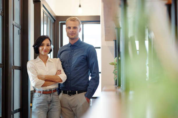 Smiling confident business people stock photo