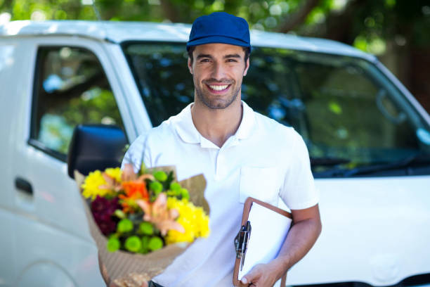 Flower Bouquet Delivery Woman Holding Roses Stock Photo - Download Image  Now - iStock