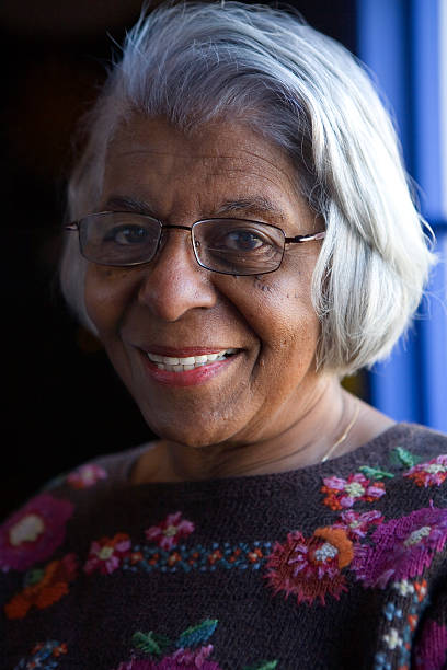 smiling elderly African American woman stock photo