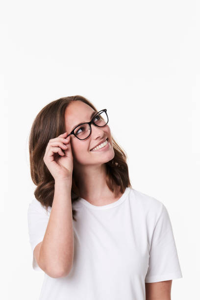 Smiling girl in glasses stock photo