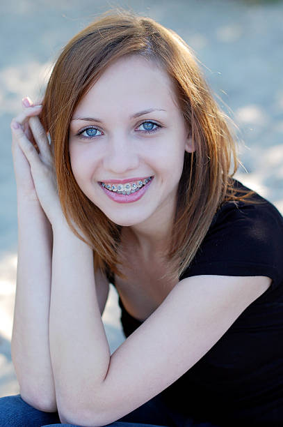 Royalty Free Pretty Girls With Braces Pictures, Images and Stock Photos ...