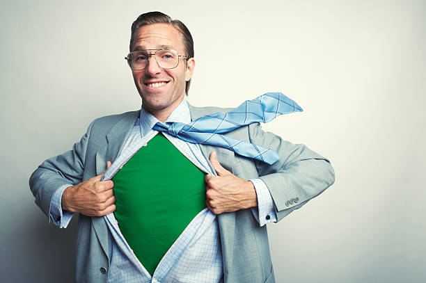 Smiling Green Office Superhero Businessman stock photo