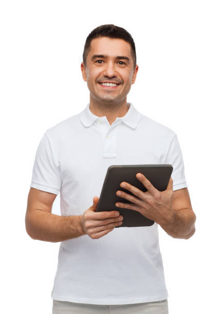 smiling man with tablet pc computer stock photo